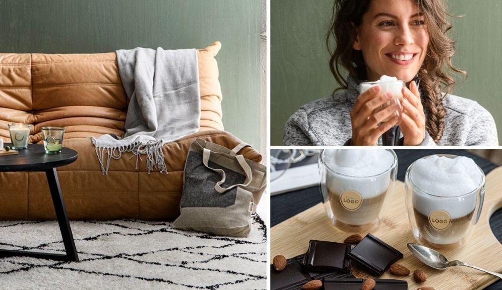 Jubiläumsgeschenke für Mitarbeiter - elegante Geschenkbox mit personalisierten Werbeartikeln und Firmenlogo.